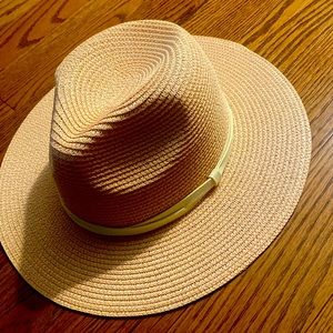 Adjustable light pink hat. Never worn